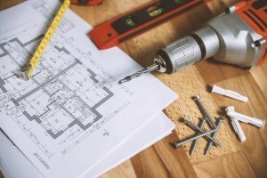 Blueprint and tools | Pexels photo 834892 | Kramer Industries Inc